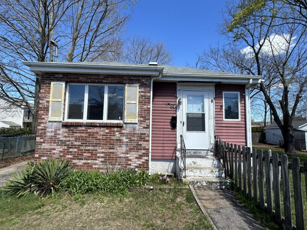 Front of a home that we bought for cash in Massachusetts.