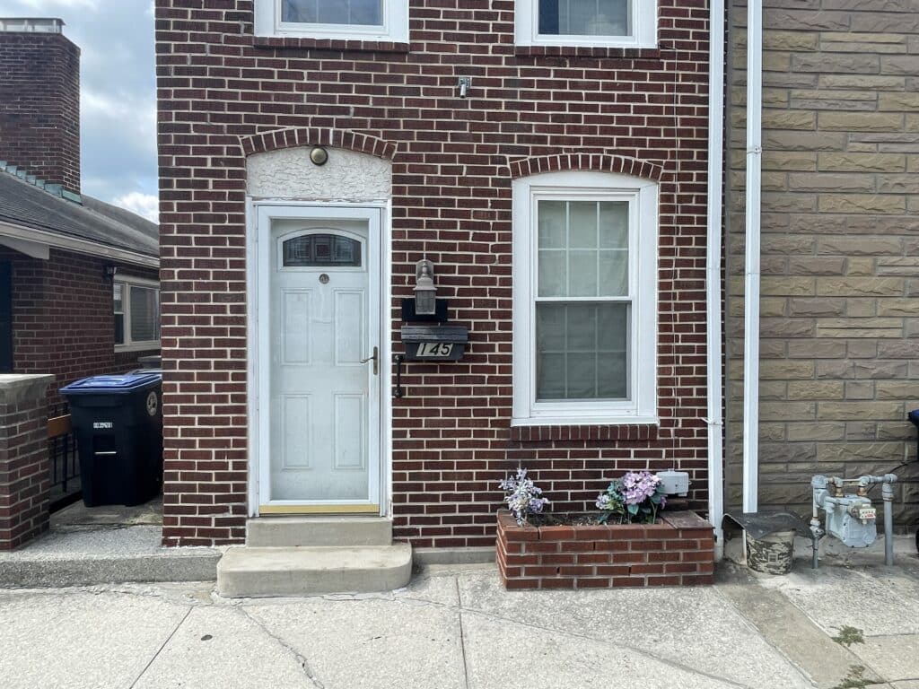 We purchased this Woonsocket, RI home fast with cash.