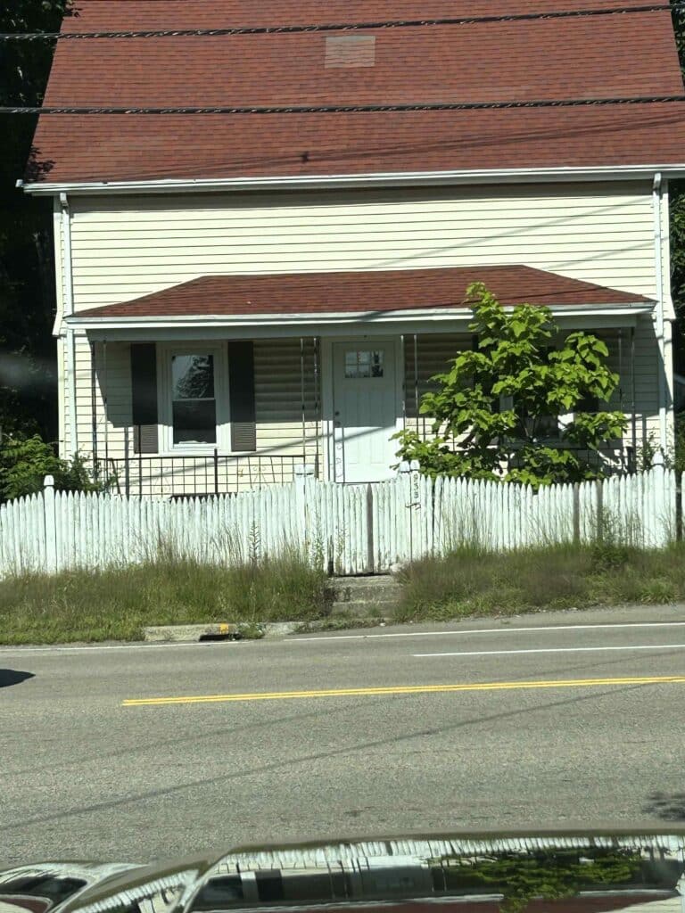 Outside of a house we bought fast with cash.