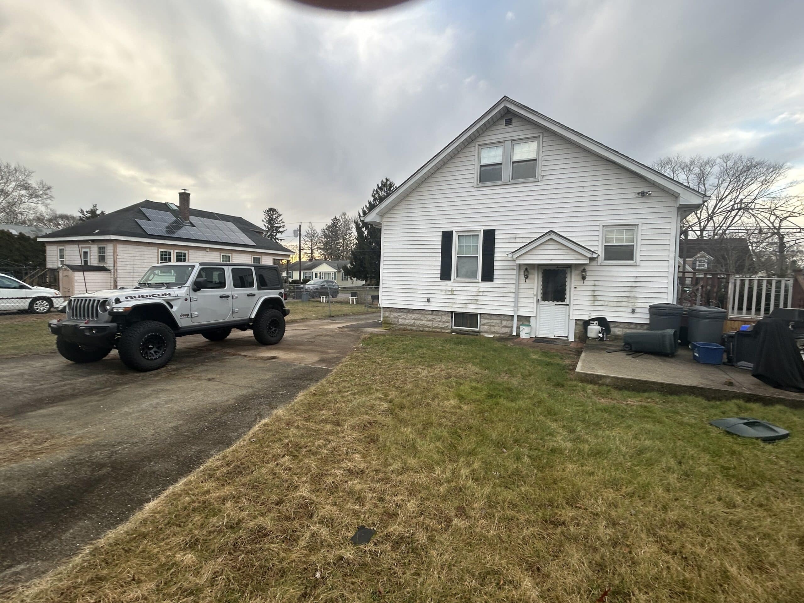 Front of a white rental property in Providence, RI